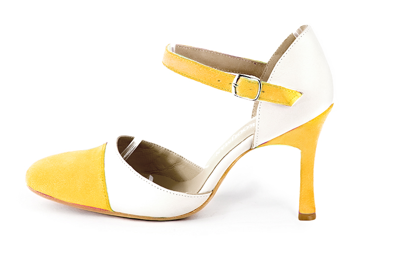 French elegance and refinement for these yellow and off white dress open side shoes, with an instep strap, 
                available in many subtle leather and colour combinations. Its high vamp and fitted strap will give you good support.
To personalize or not, according to your inspiration and your needs.  
                Matching clutches for parties, ceremonies and weddings.   
                You can customize these shoes to perfectly match your tastes or needs, and have a unique model.  
                Choice of leathers, colours, knots and heels. 
                Wide range of materials and shades carefully chosen.  
                Rich collection of flat, low, mid and high heels.  
                Small and large shoe sizes - Florence KOOIJMAN